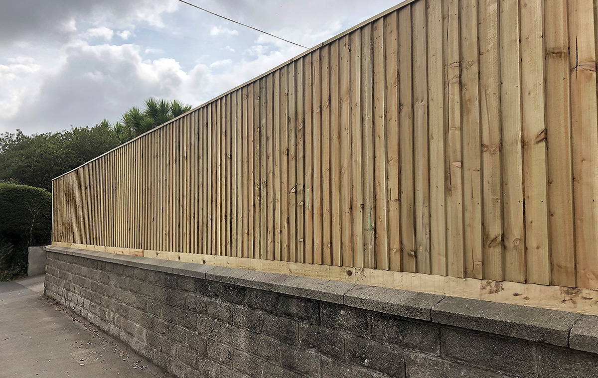 Close-up of high-quality wooden fence panels installed in West Cornwall